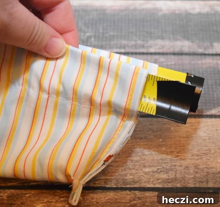 DIY Snappy Wipes Pouch Tutorial: Sew a Portable Wipes Holder 13 Insert the tape measure pieces