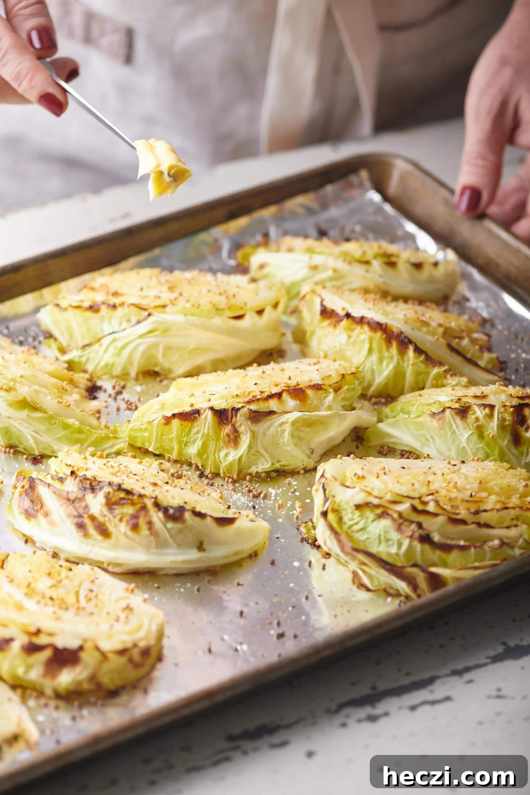 How to Cook Cabbage: Simple Recipes and Perfect Techniques 5 Roasted Cabbage Wedges on baking sheet.