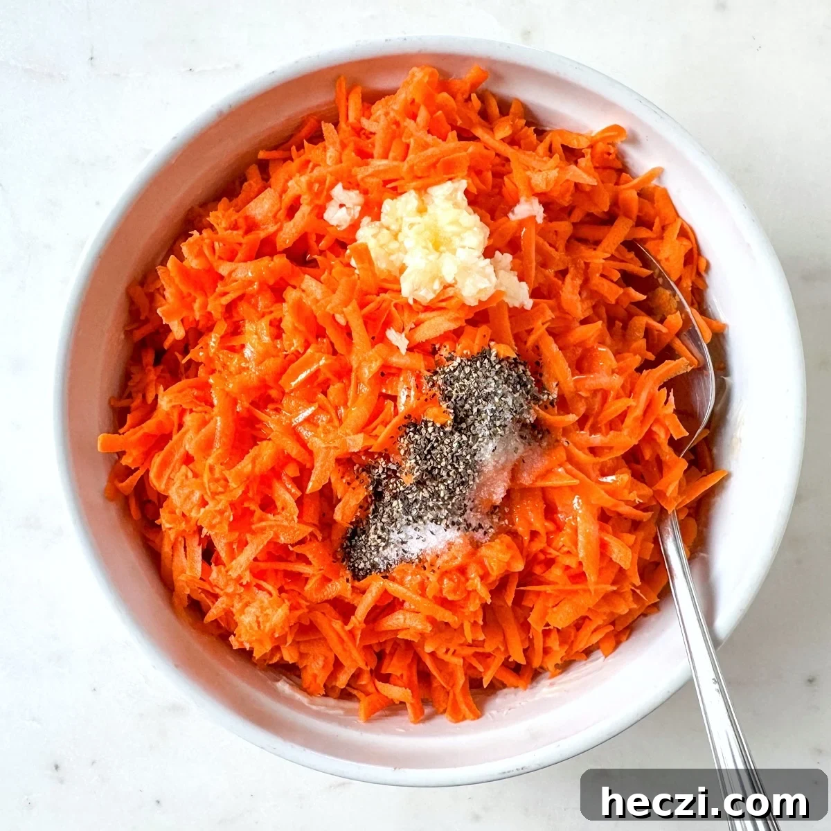 Grated Baked Carrots with Lemon and Garlic Roast Recipe 5 mixing ingredients in a round baking dish