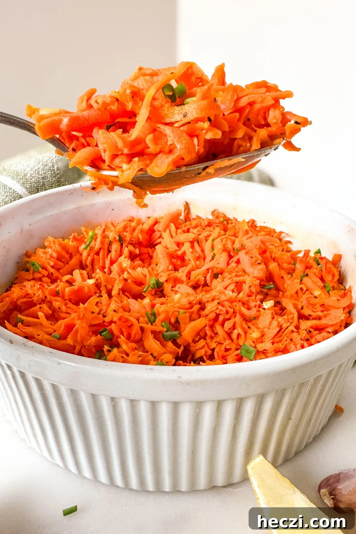 Grated Baked Carrots with Lemon and Garlic Roast Recipe 6 serving grated baked carrots from a white baking dish