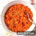 Grated Baked Carrots with Lemon and Garlic Roast Recipe 7 grated baked carrots in white bowl with spoon