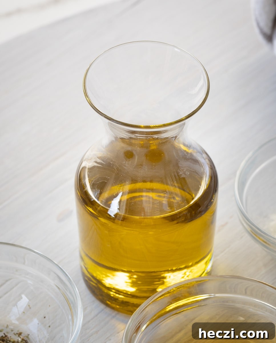 Homemade Italian Dressing Recipe: Classic Flavor in Minutes 5 golden olive oil in a cruet.