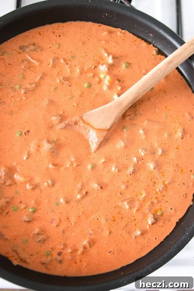 Rustic Sausage Rigatoni with Creamy Tomato Sauce 7 Tomato Cream Sauce with peas and sausage