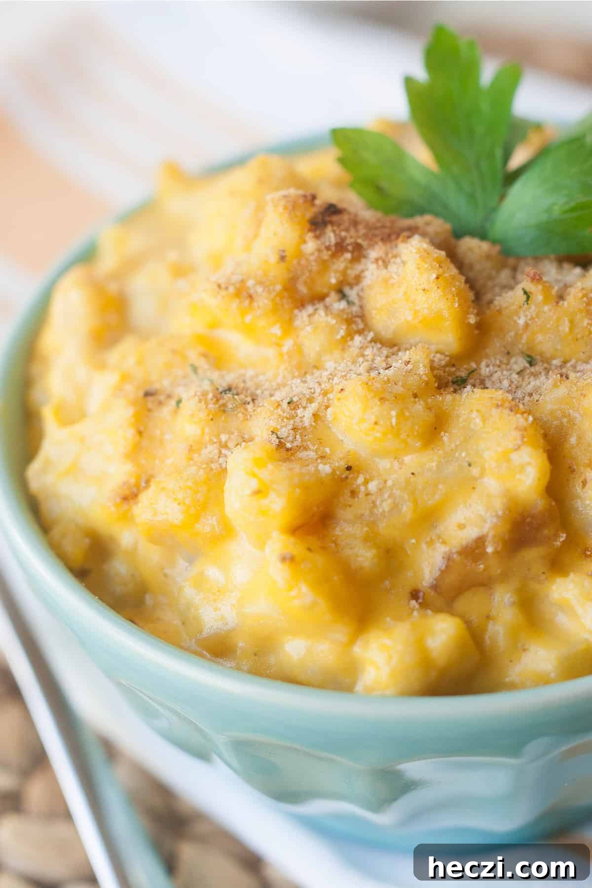 Creamy Paleo Mac and Cheese (Video Recipe) 2 Coconut milk mac and cheese in a turquoise bowl