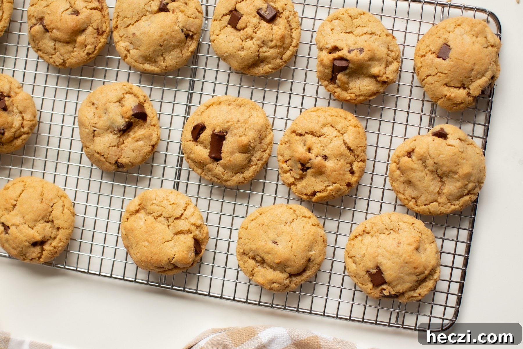 coconut chocolate chip cookies on a cooling rack 