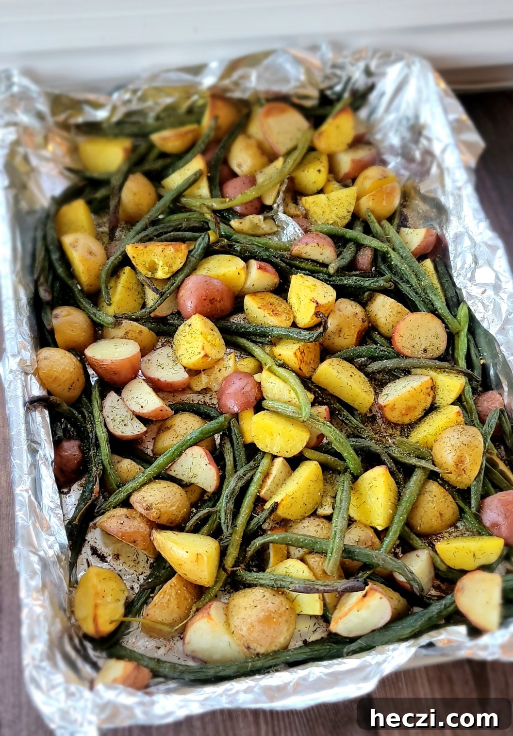 Roasted green beans and potatoes fresh from oven
