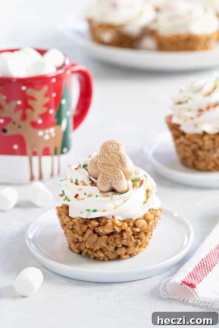 Gingerbread Marshmallow Treat Cupcakes are an adorable and delicious addition to any holiday dessert plate! Festive sprinkles make and mini gingerbread marshmallows make them merry and bright
