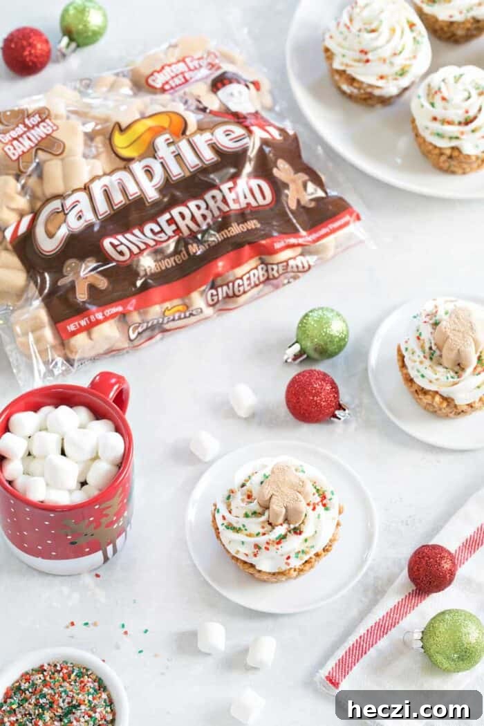 Gingerbread Marshmallow Treat Cupcakes are an adorable and delicious addition to any holiday dessert plate! Fun and totally festive!