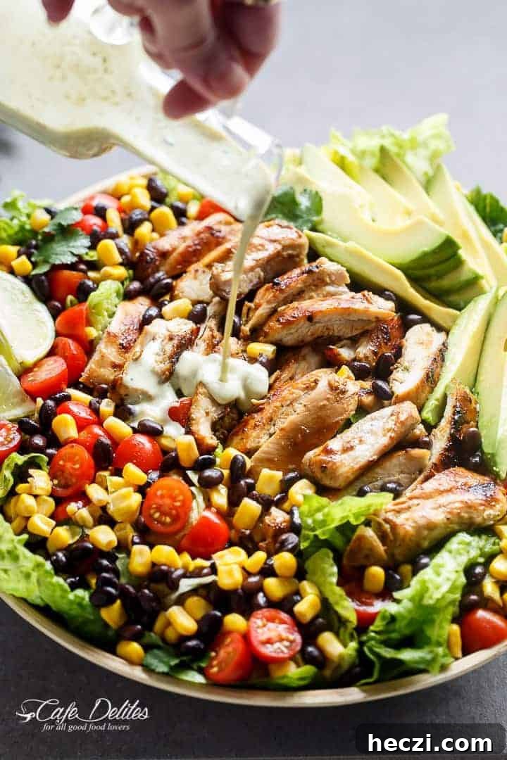 Southwestern Chicken Salad Recipe: Zesty Ingredients & Creamy Avocado 12 A Low Fat Creamy Dressing pouring over Southwestern Chicken Salad