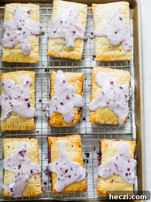 Blueberry Coffee Cake Recipe with Streusel Crumbs 13 Blueberry pop tarts on a cooling rack.