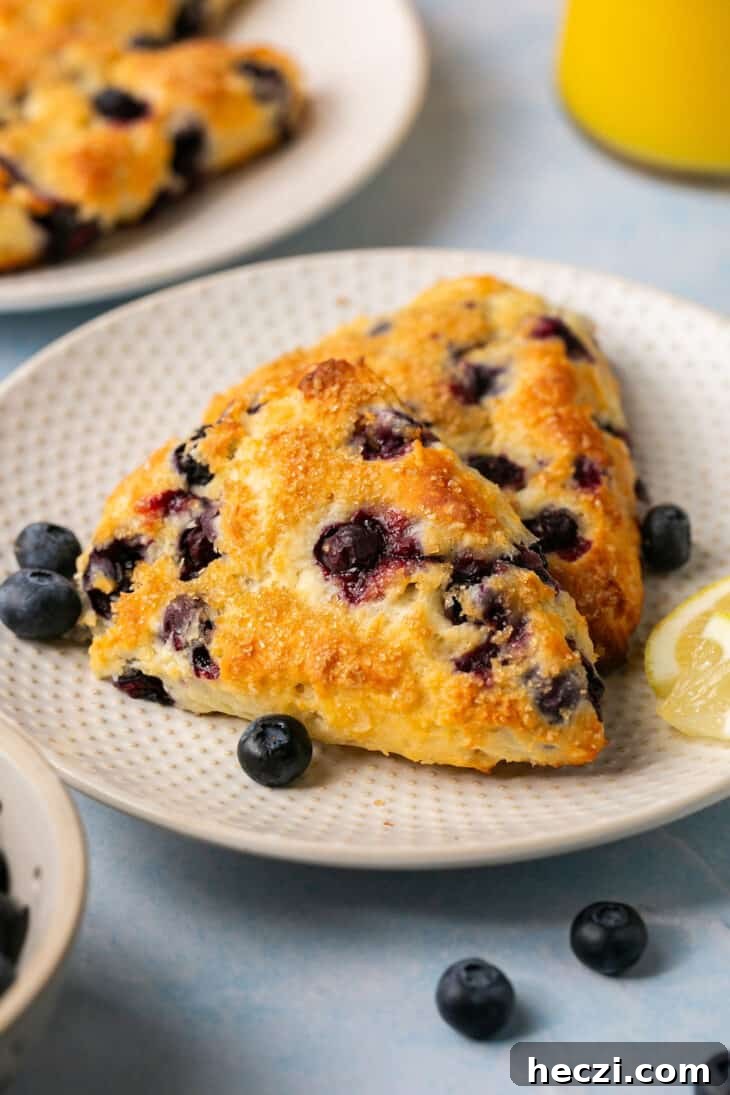 blueberry scones on a plate. 