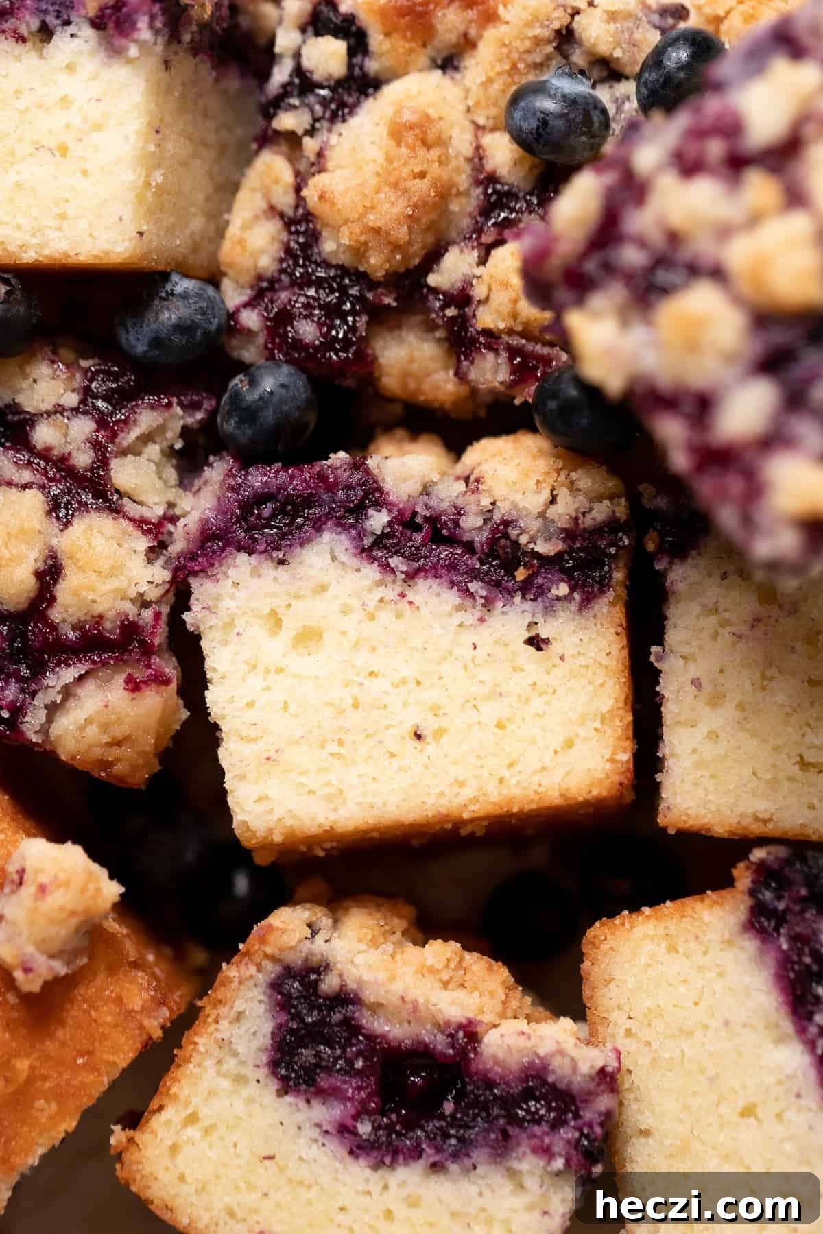 slices of cake with a blueberry swirl.