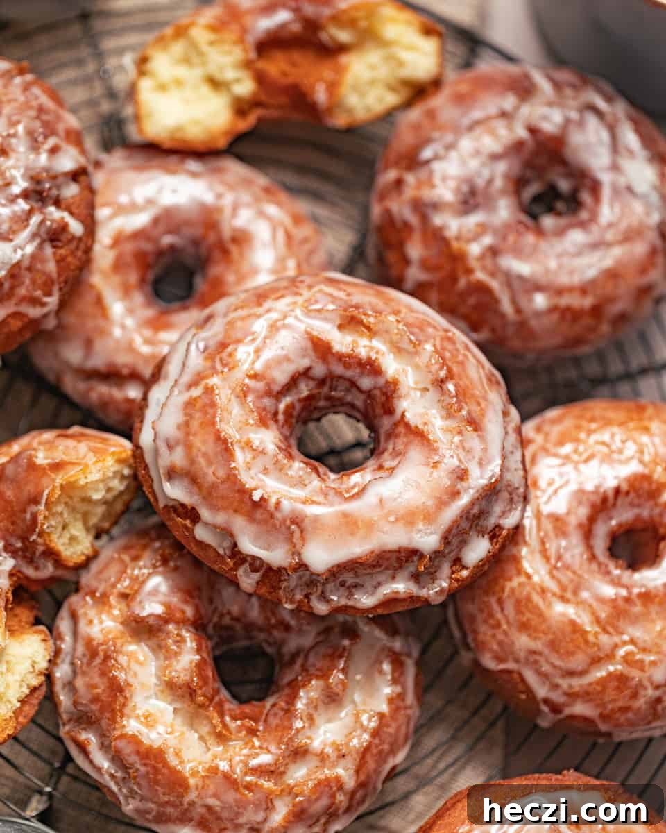 sour cream donuts stacked on top of each other.