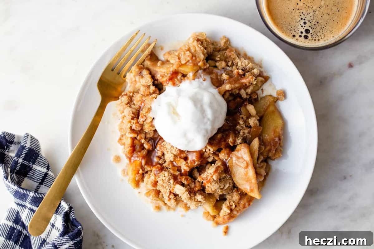 Warm Caramel Apple Crisp with Crunchy Oat Topping 5 Overhead view of caramel apple crisp topped with ice cream