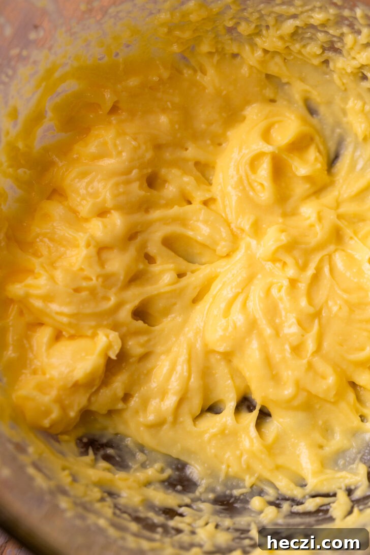 Lemon Blueberry Mousse Cake Recipe — Light Layered Dessert 6 Vanilla pudding in a bowl.
