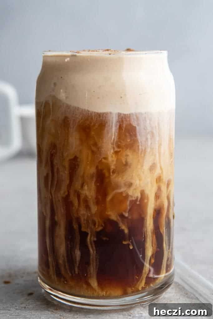 Starbucks Pumpkin Cream Cold Brew Review: Flavor, Price & Tips 2 Pumpkin cream cold brew in a glass