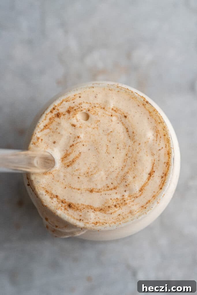Starbucks Pumpkin Cream Cold Brew Review: Flavor, Price & Tips 4 Overhead shot of pumpkin cold foam