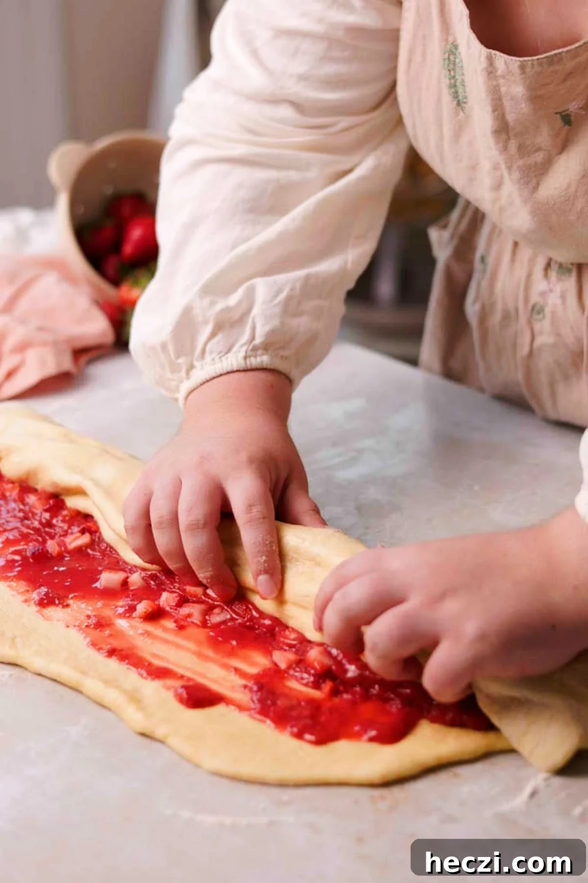 Strawberry Cinnamon Rolls with Cream Cheese Glaze 14 rolling strawberry cinnamon rolls by hand