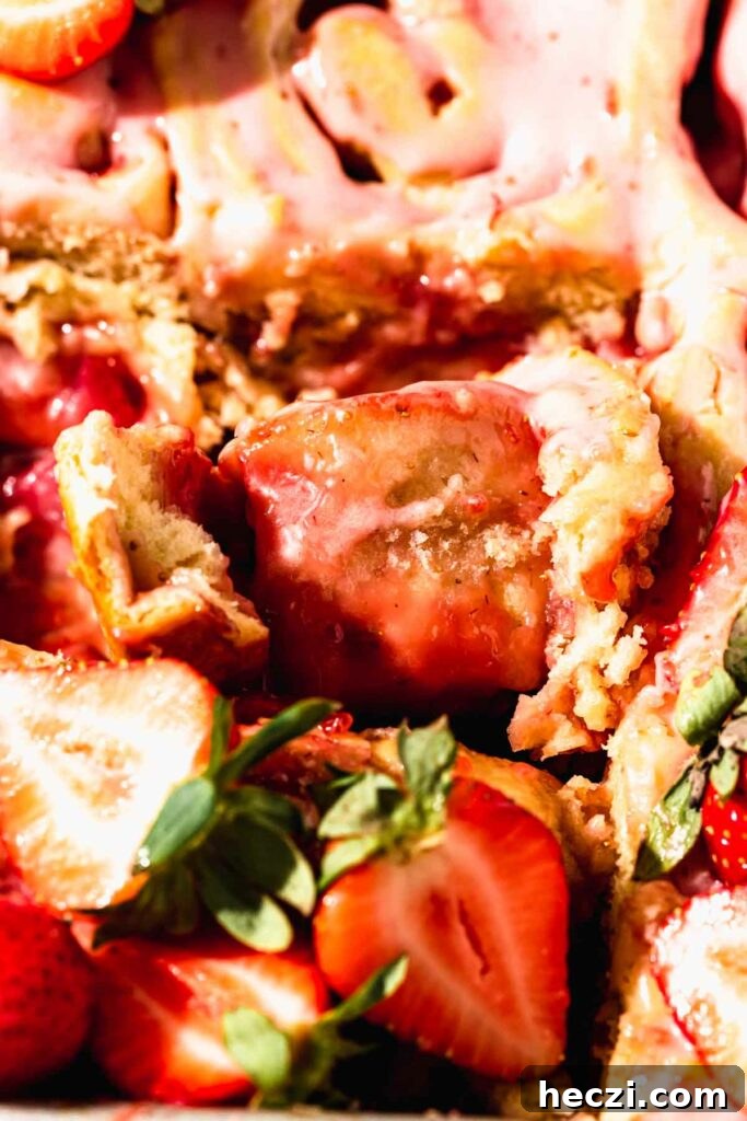 Strawberry Cinnamon Rolls with Cream Cheese Glaze 3 gooey strawberry cream cheese roll texture