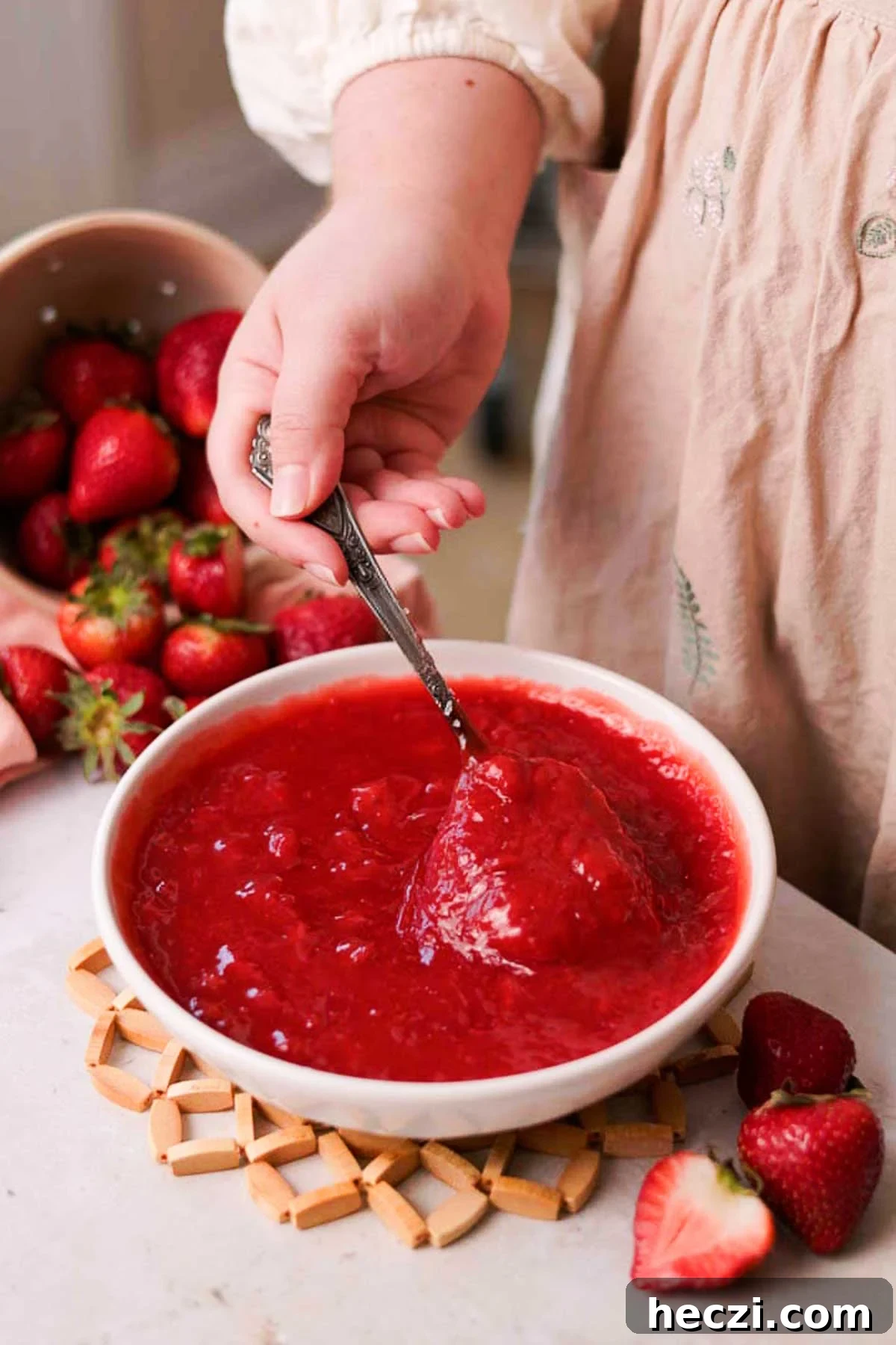 Strawberry Cinnamon Rolls with Cream Cheese Glaze 6 cooked strawberry sauce in a bowl