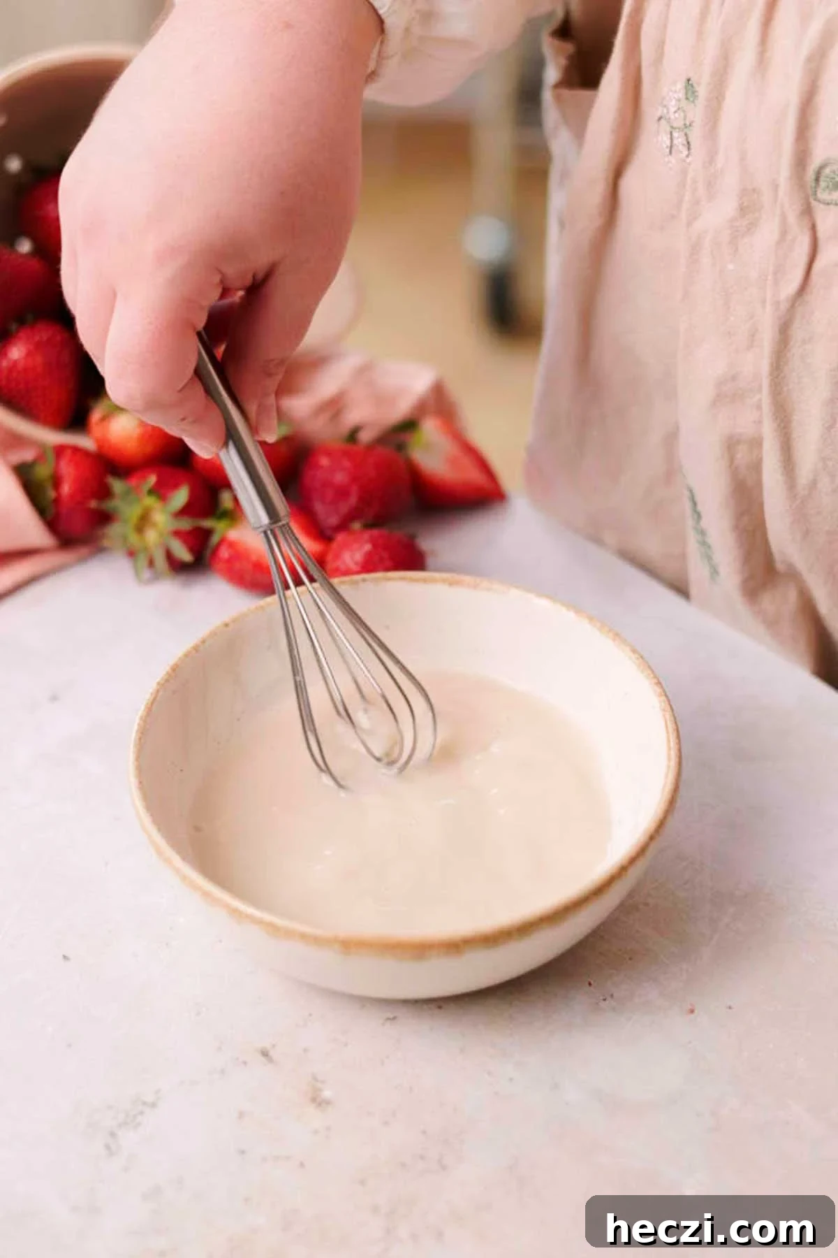 Strawberry Cinnamon Rolls with Cream Cheese Glaze 7 whisking together yeast, sugar, and water in a medium bowl