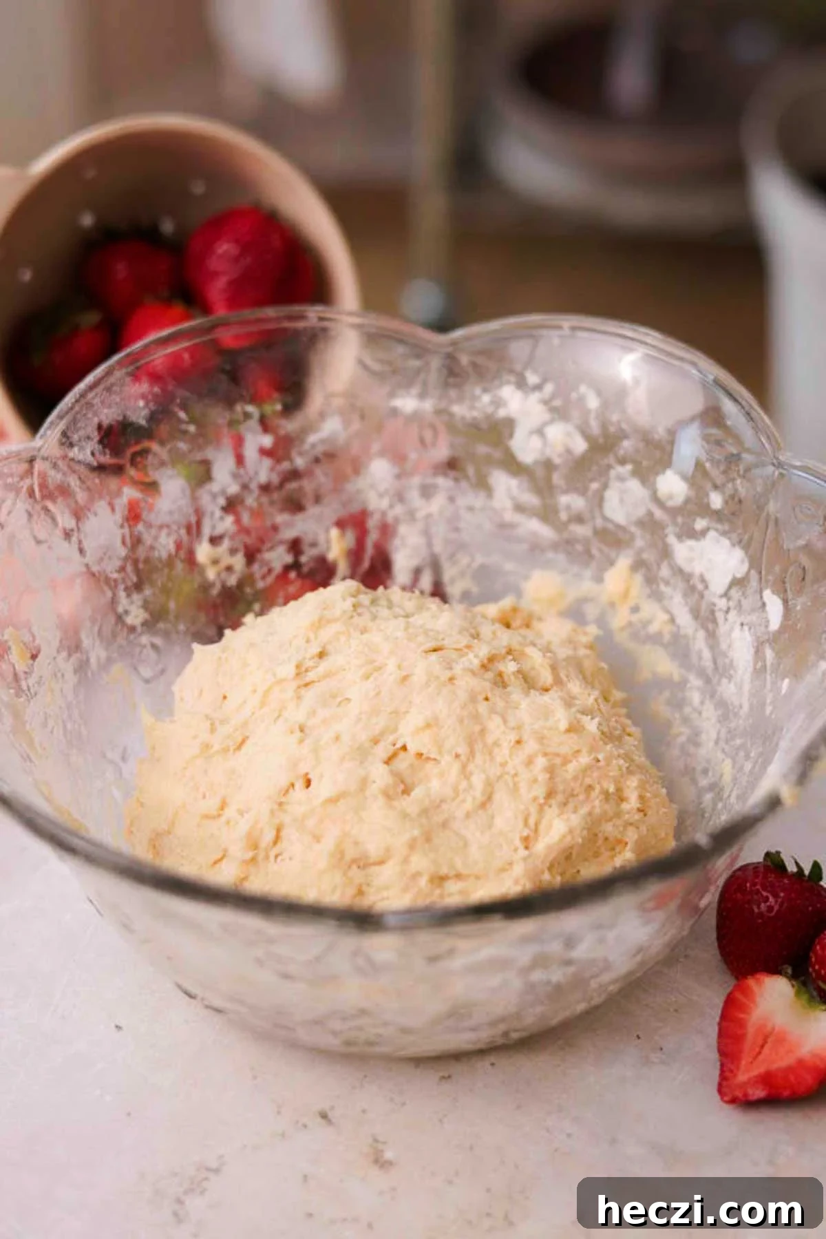 Strawberry Cinnamon Rolls with Cream Cheese Glaze 9 ball of dough in a large glass bowl