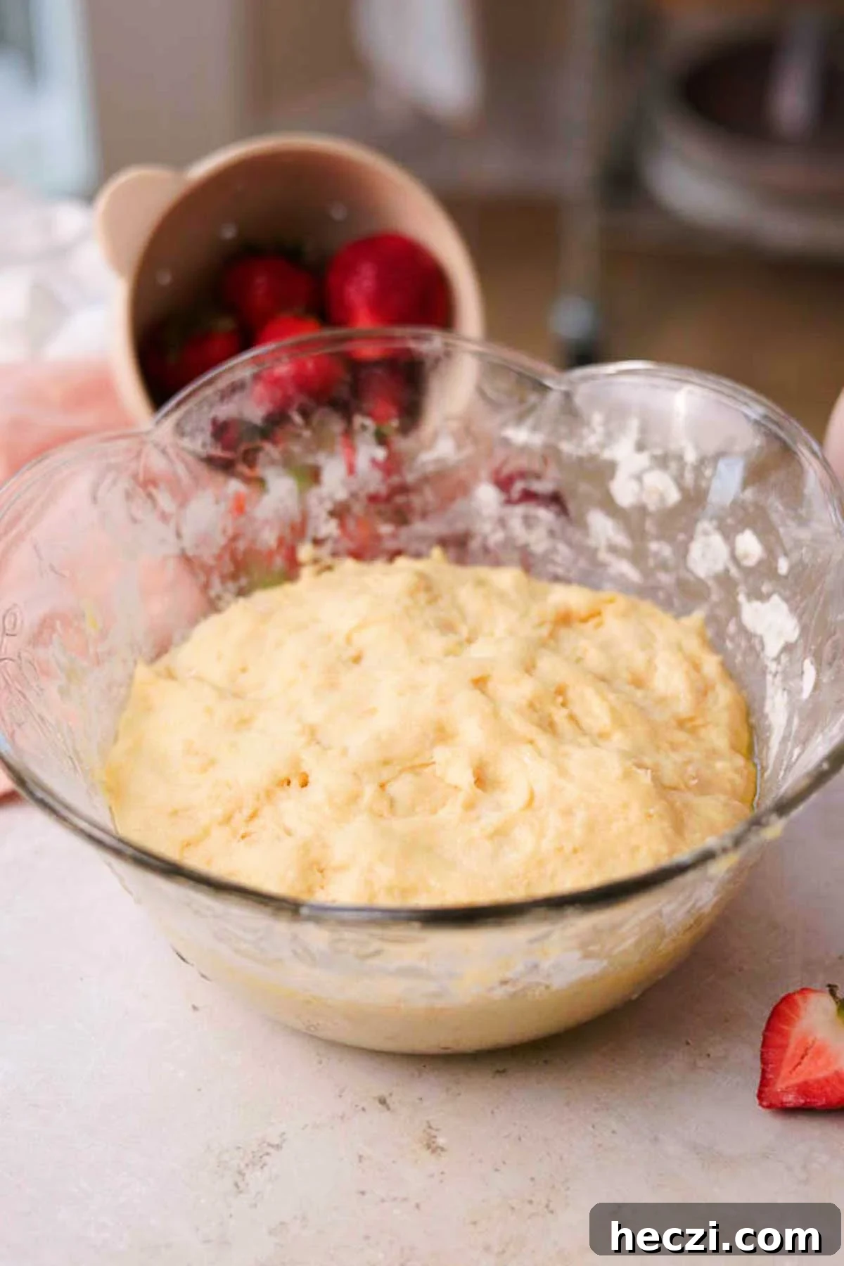 Strawberry Cinnamon Rolls with Cream Cheese Glaze 10 Risen dough in a large glass bowl