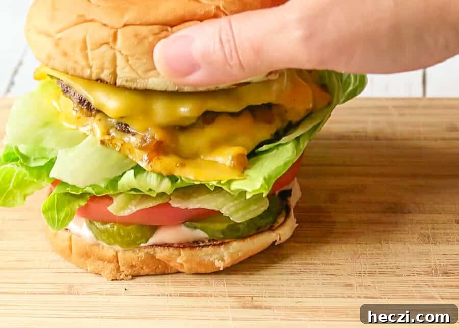 assembling the Double-Double Animal Style Burger