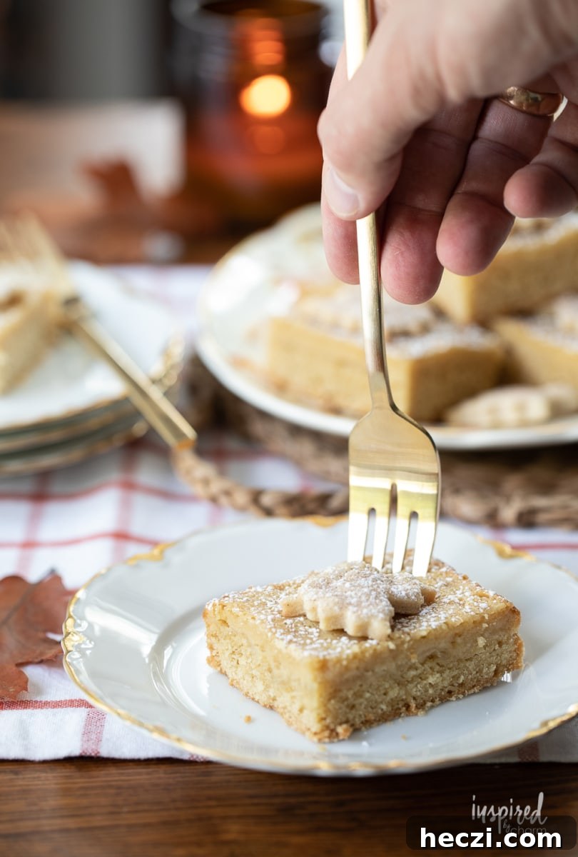 rich maple butter bar on plate with fork.