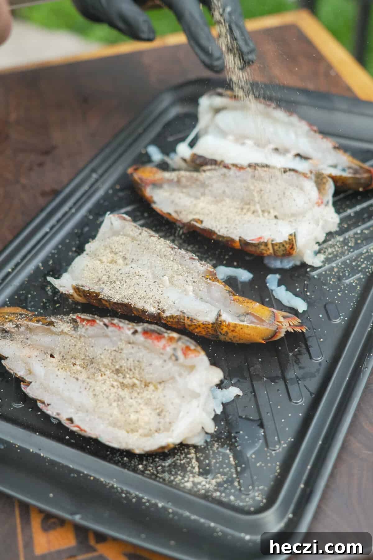 Beer-Butter Grilled Lobster Tails Recipe for Summer BBQ 5 The lobster is prepped for the grill. Get ready for a buttery bite!