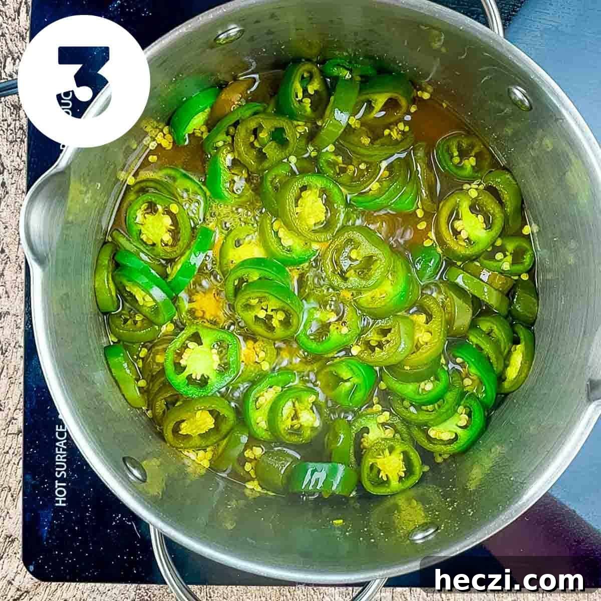 Small-Batch Cowboy Candy Canning Recipe for Spicy Candied Jalapeños 6 The sliced jalapenos after they simmered in the pot for 4 minutes.