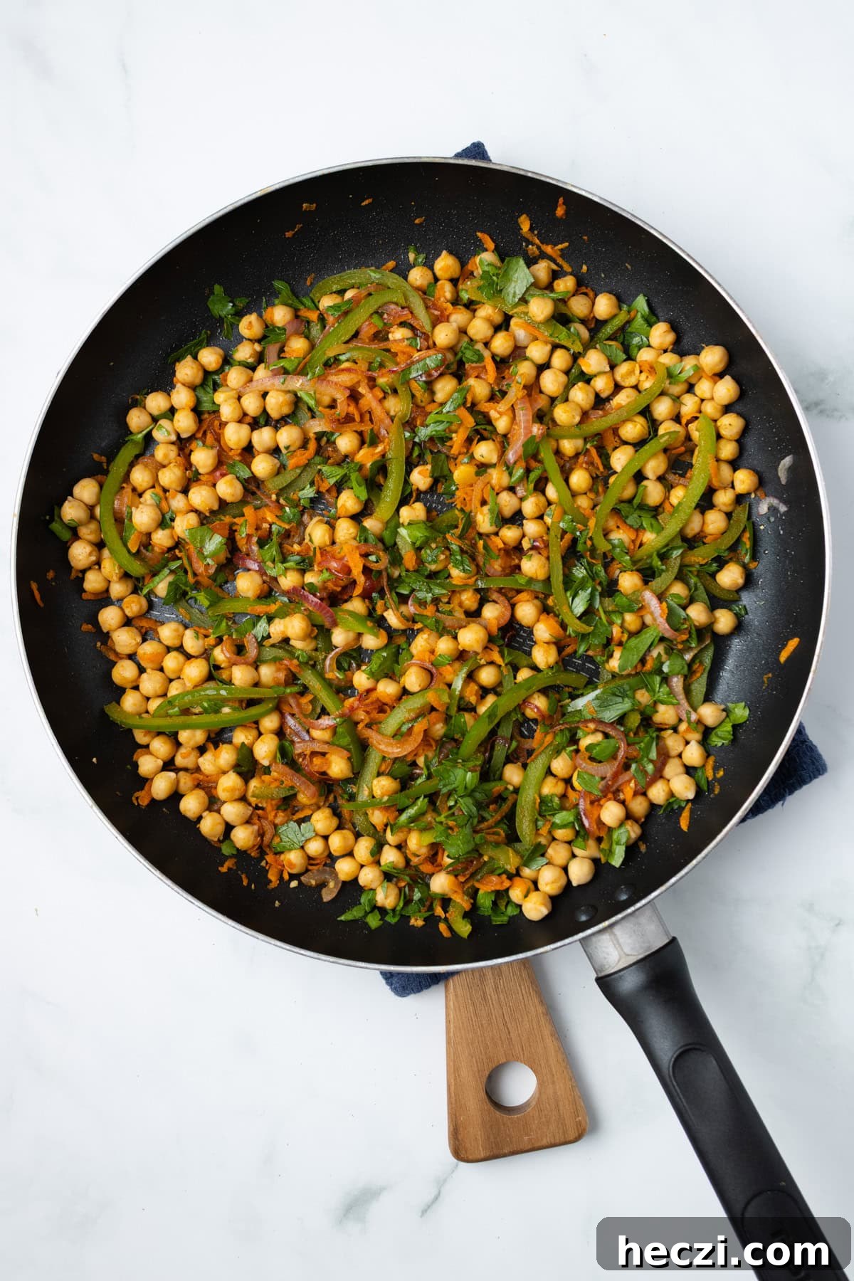An overhead image of cooking the veggie fillings.