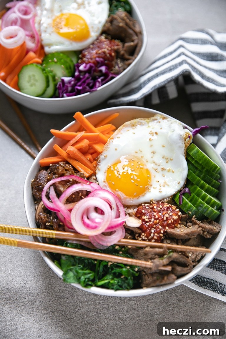 Easy bibimbap with beef, spinach, mushrooms, and egg