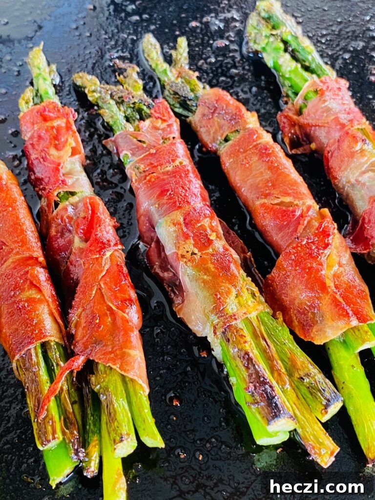 Holiday Recipes for Your Blackstone Griddle: Festive Griddle Meals 14 Blackstone Prosciutto Wrapped Asparagus