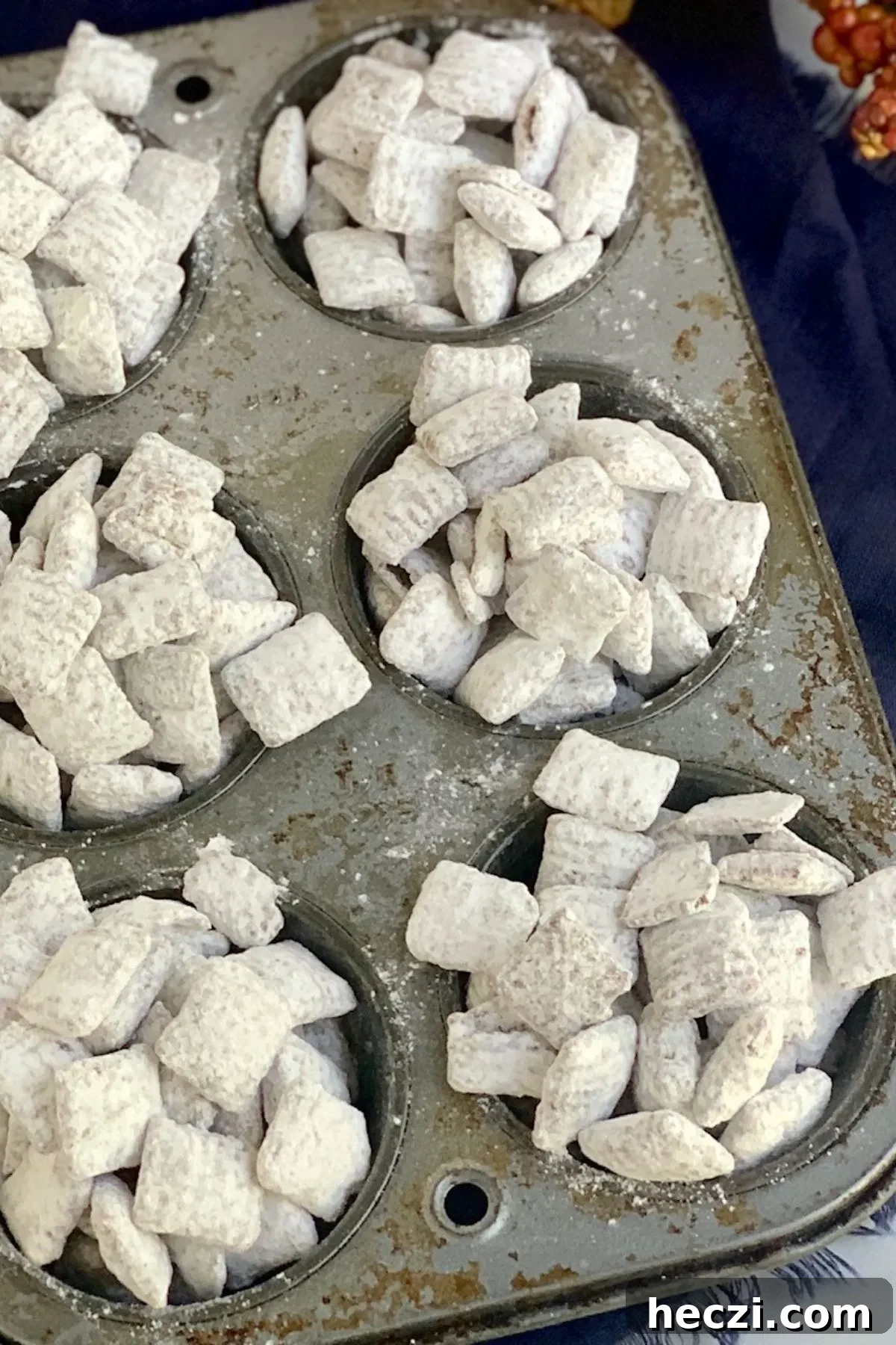 Gluten- and Dairy-Free Puppy Chow Recipe for Dogs with Allergies 4 A baking pan with gluten free dairy free muddy buddies.