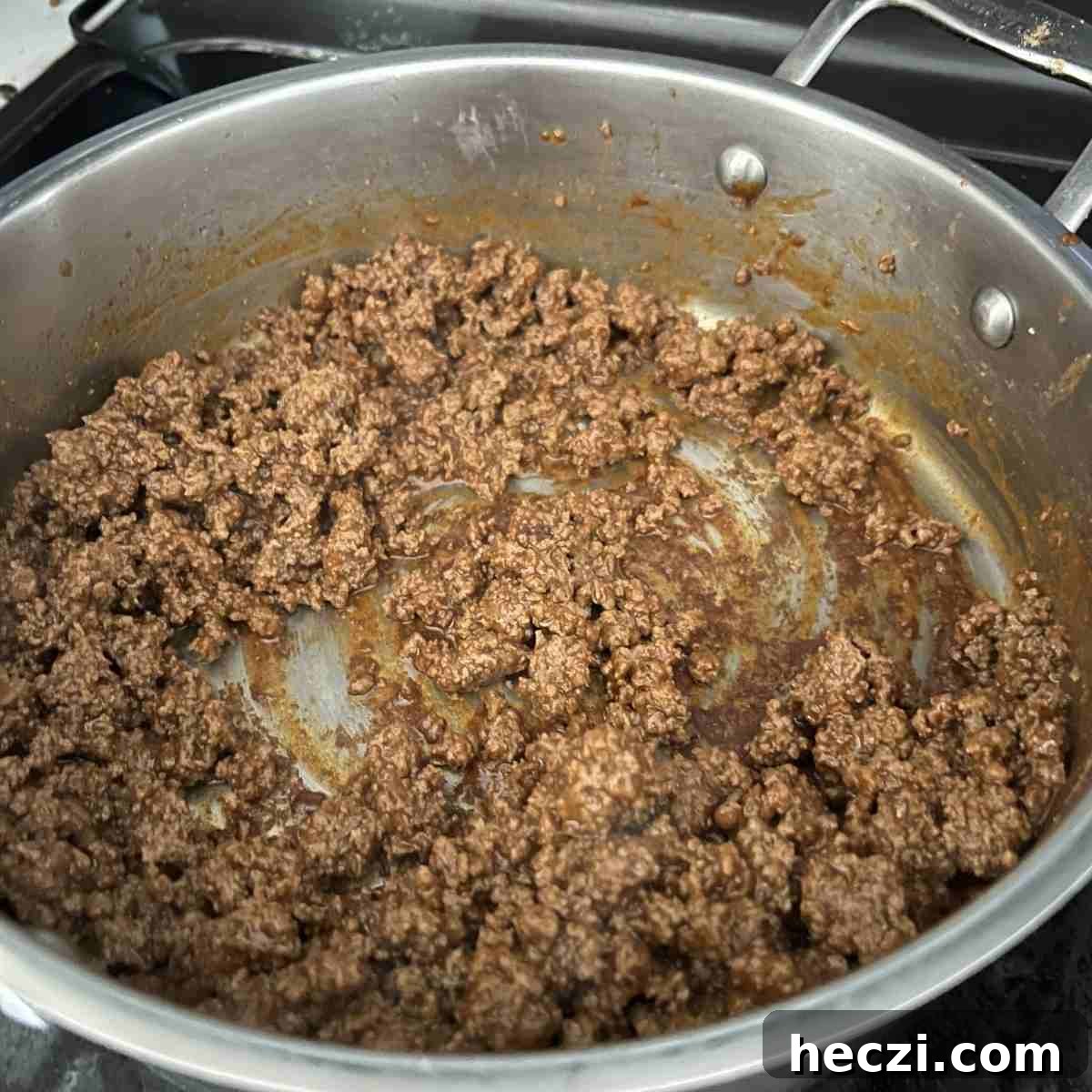 Mexican Street Corn Sweet Potato Bowls Recipe for Flavorful Meals 4 Seasoned cooked ground beef in a pan.
