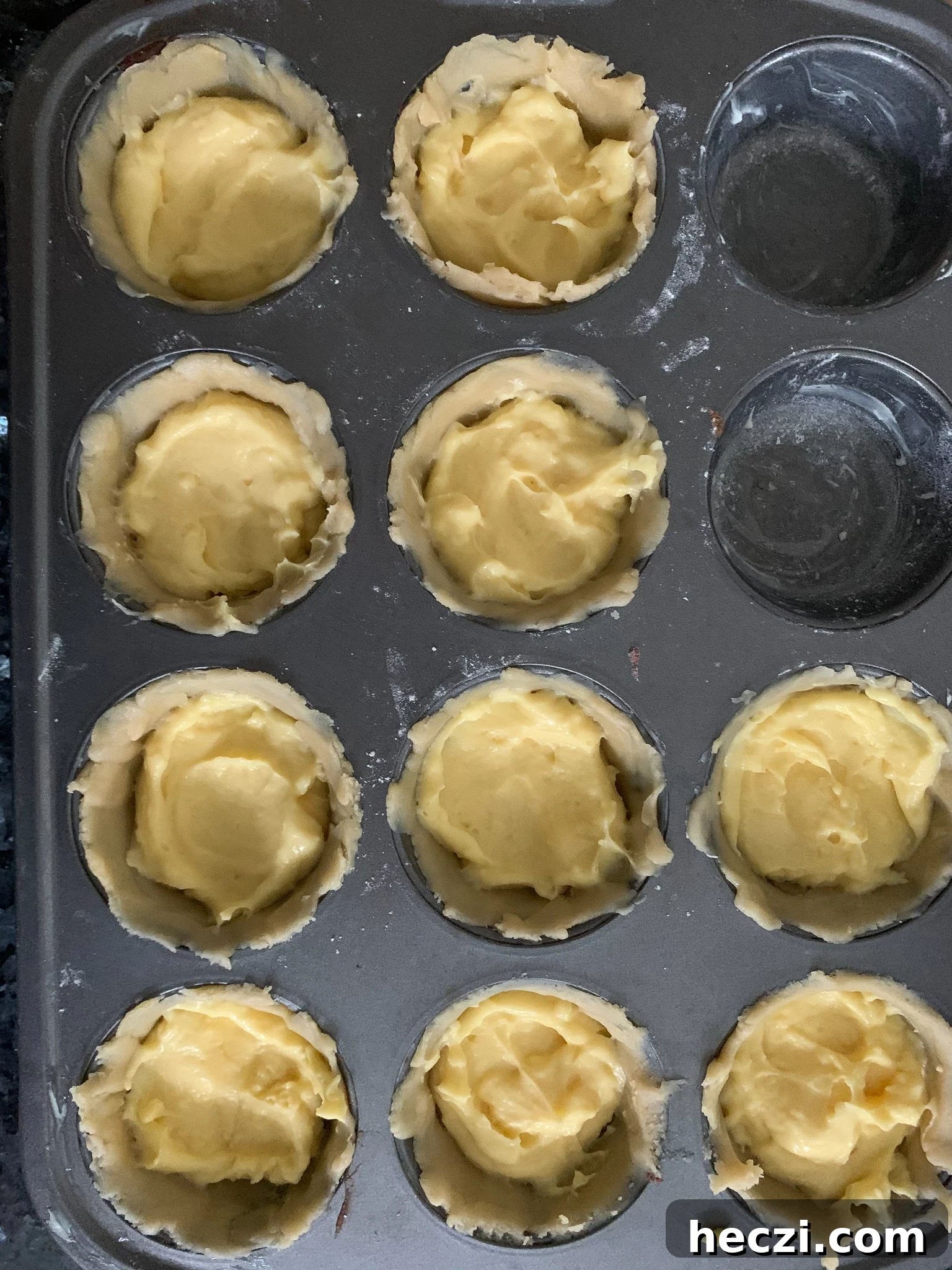 Cremelinser Mini Custard Pies Recipe – Norwegian Cream Tarts 5 Custard pies in the process of being filled