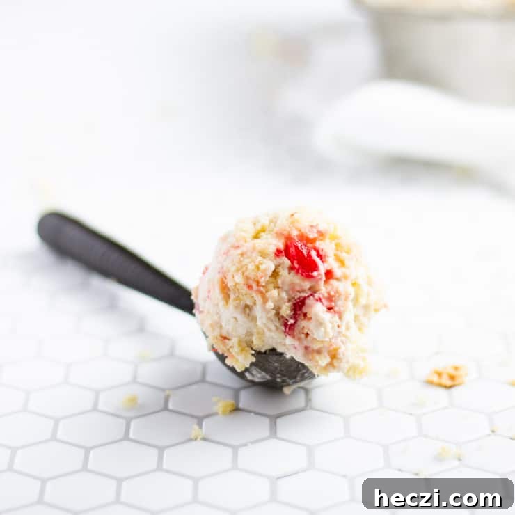 Pineapple Upside-Down Cake Ice Cream (No-Churn Recipe) 6 close up of a scoop of ice cream