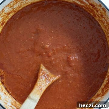 Homemade Italian Sunday Sauce Recipe for Classic Pasta Night 11 Sunday sauce in a pot.