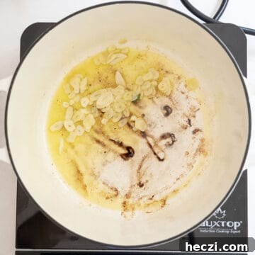 Homemade Italian Sunday Sauce Recipe for Classic Pasta Night 7 Sauteing garlic in the pot.