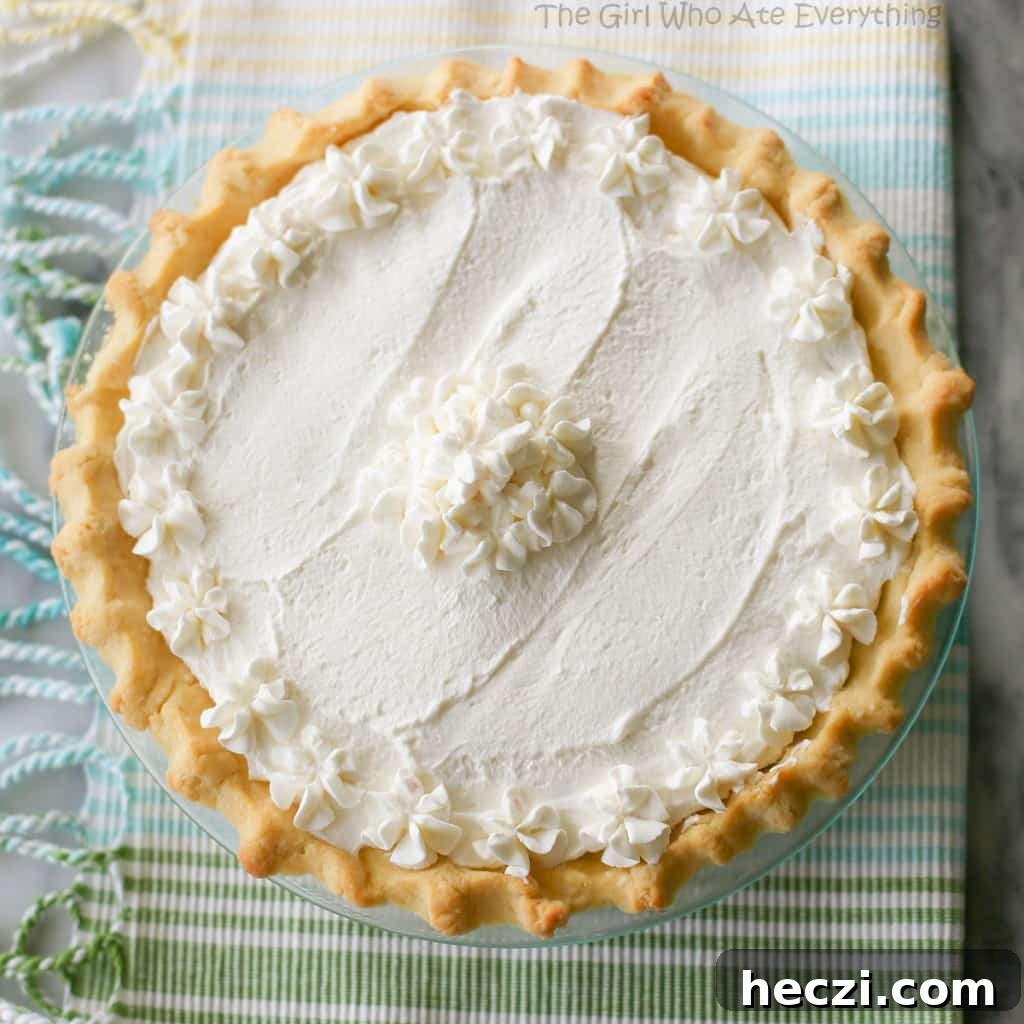This Banana Cream Pie is made with a super easy homemade custard and layers of bananas. the-girl-who-ate-everything.com