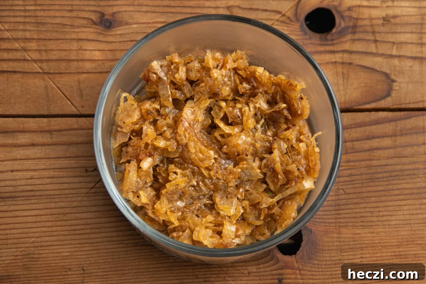 Caramelized Onion Dip with Greek Yogurt — Creamy Savory Recipe 11 This is a picture of the cooked onions in a bowl to cool down.