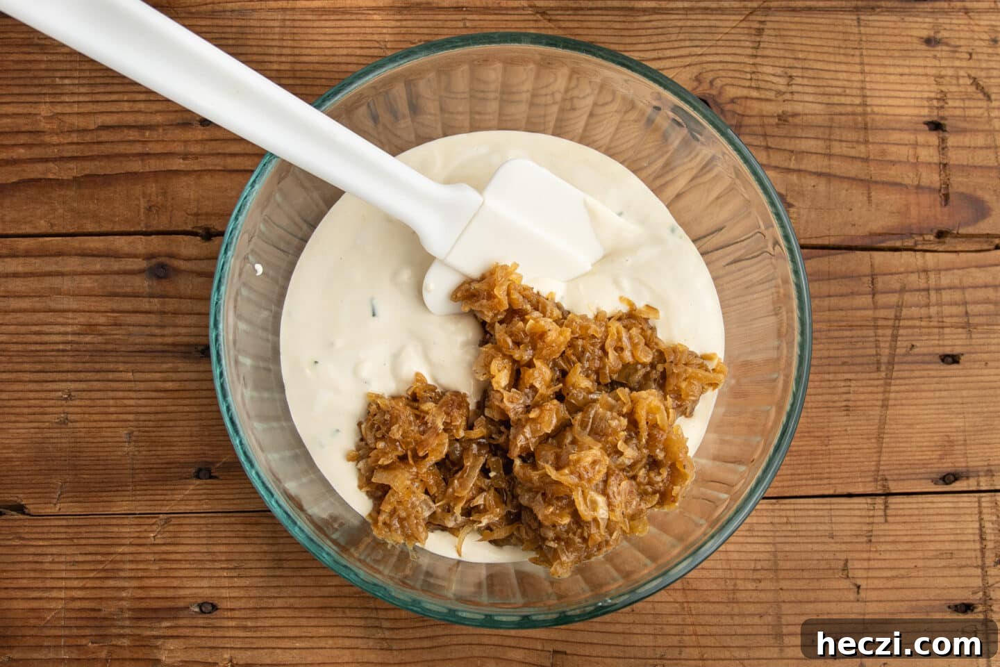 Caramelized Onion Dip with Greek Yogurt — Creamy Savory Recipe 12 This is a picture of the cooked onions added to the greek yogurt.