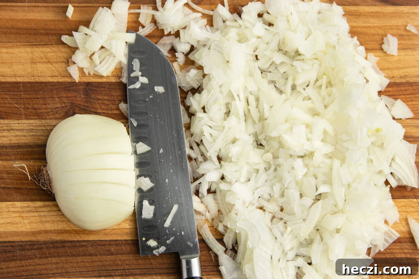 Caramelized Onion Dip with Greek Yogurt — Creamy Savory Recipe 5 This is a picture of onions being chopped.