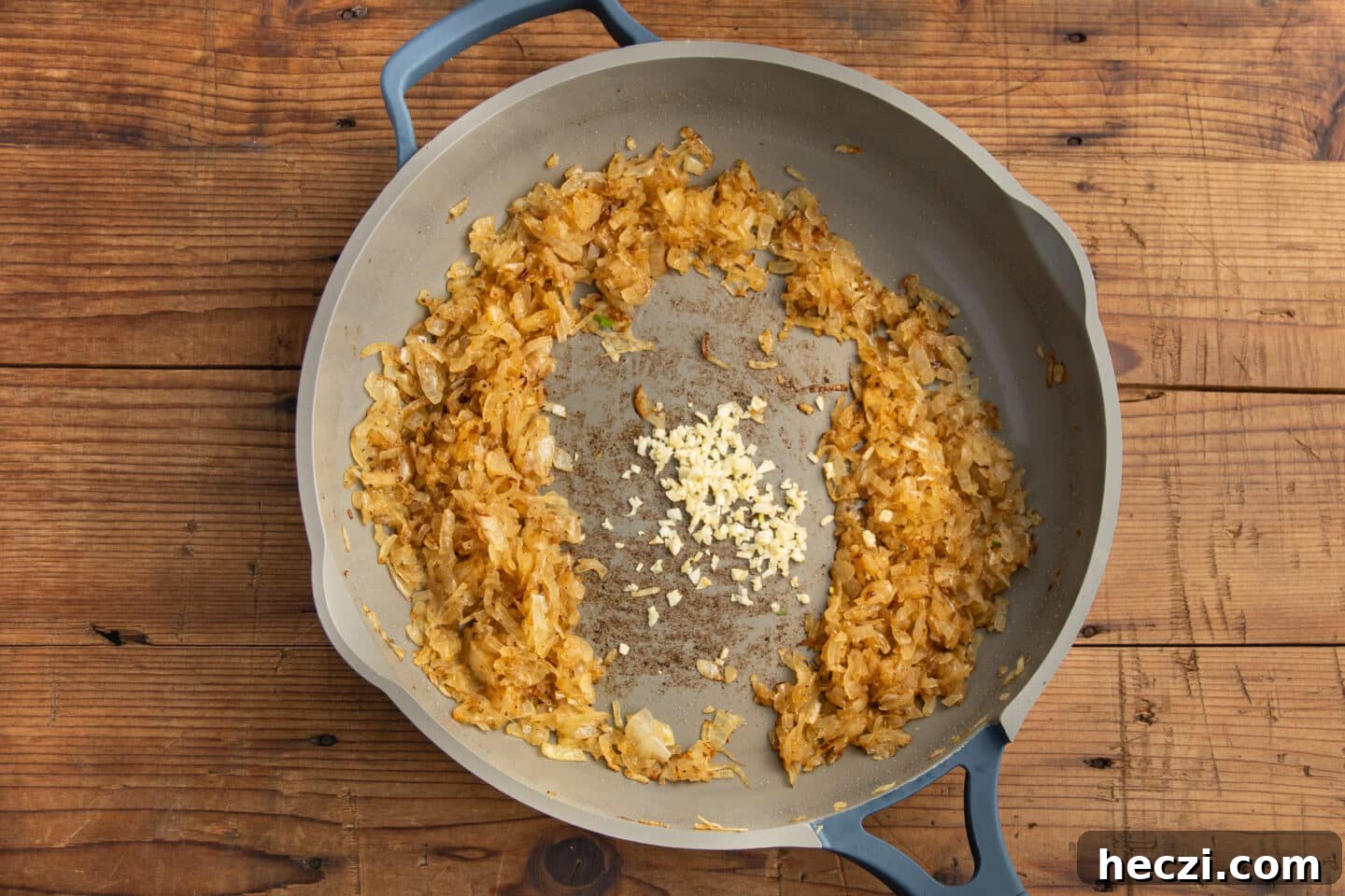 Caramelized Onion Dip with Greek Yogurt — Creamy Savory Recipe 8 This is a picture of the skillet with the onions cooking and added garlic.