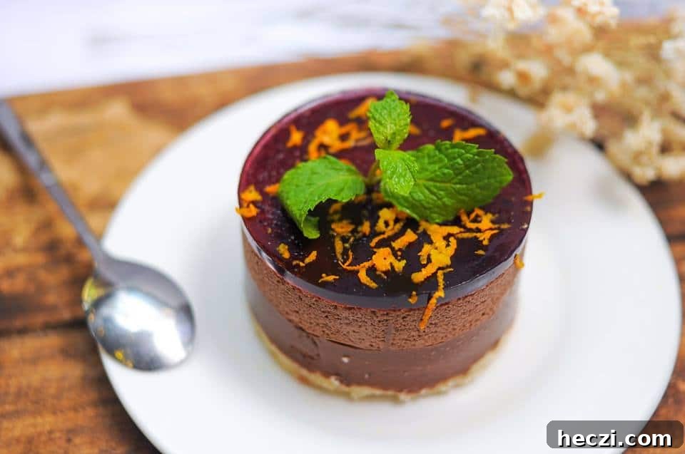 Light and Creamy Orange Mint Mousse Recipe 2 A close up of a piece of cake on a plate, with Mint and Mousse