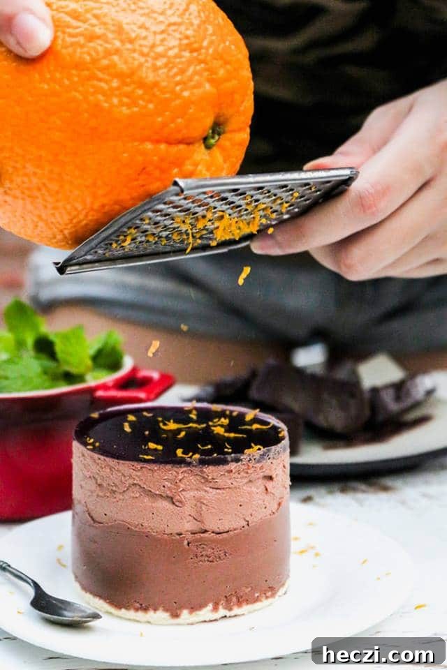 Light and Creamy Orange Mint Mousse Recipe 3 A close up of a cake with Mousse, orange and chocolate