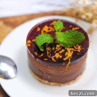 Light and Creamy Orange Mint Mousse Recipe 5 A close up of a piece of cake on a plate, with Mint and Mousse