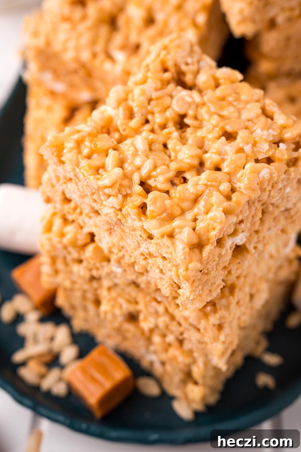 Close up photo of a stack of salted caramel rice krispie treats.