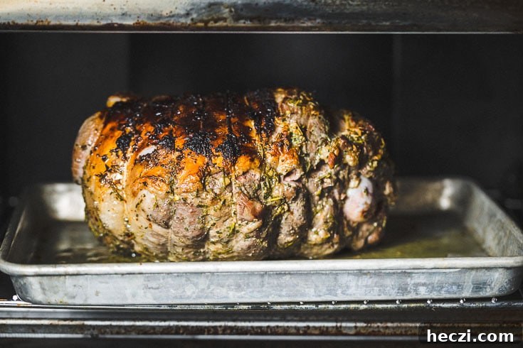 sous vide leg of lamb browning in oven